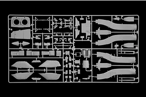 Grey plastic model kit sprue containing various aircraft parts against a black background.