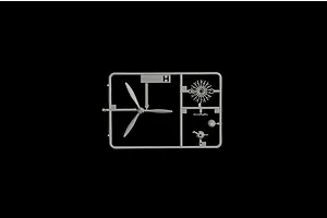 Grey plastic model kit sprue containing a three-bladed propeller, radial engine, and small components against a plain black background.