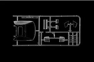 Clear plastic model kit sprue containing windows and transparent parts for a 1/24 scale Lamborghini Murcielago model car against a black background.