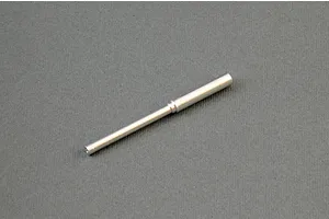 An aftermarket turned metal tank gun barrel upgrade part placed on a solid grey background.