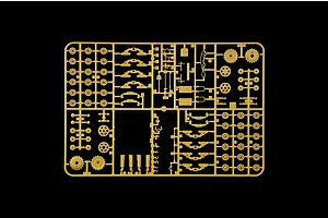 Tan plastic model kit sprue containing various tank suspension components, wheels, and small parts on a black background.