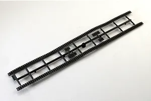 Black plastic model tank tracks sprue on a clean white background.