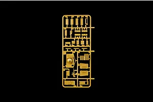 Tan plastic model kit sprue containing various parts and components on a solid black background.