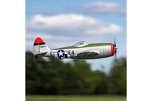 E-Flite Micro P-47 Thunderbolt RC warbird plane in flight against an outdoor sky background.