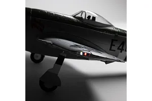 Close-up view of the E-Flite Micro P-47 Thunderbolt RC airplane showing illuminated wing tip lights and landing gear.