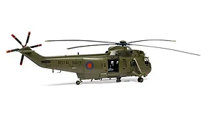 A completed and painted 1/48 scale model of a Royal Navy Westland Sea King HC.4 helicopter in olive green livery.