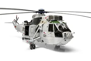 Completed Airfix 1/48 scale model of a Royal Navy Westland Sea King HC.4 helicopter in white and green camouflage against a plain white background.
