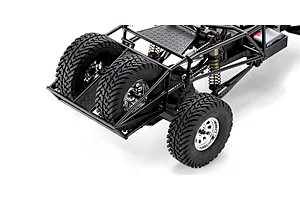 Close-up studio view of the rear tubular roll cage and spare tires on the Kyosho Outlaw Renegade RC truck.