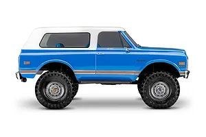 Studio side profile shot of the Traxxas TRX-4 Chevrolet Blazer RC rock crawler in blue with a white removable hardtop.