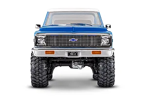 Front view of the Traxxas TRX-4 Chevrolet Blazer RC rock crawler showcasing its blue body, white roof, and large tires.