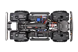 Top-down studio view of the chassis, motor, electronics, and interior frame layout of the Traxxas TRX-4 RC rock crawler.