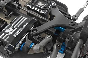 Close-up of the steering mechanism and servo on the Team Associated RC10B84.1D 1/10 scale buggy chassis.