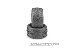 Two JConcepts Ellipse rear buggy tyres stacked on a white background, showing tread patterns.