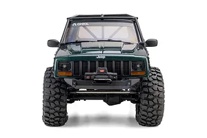 Front view of the Axial SCX10 III Jeep Cherokee XJ RC rock crawler in green, featuring a Warn winch bumper and aggressive tread tyres.
