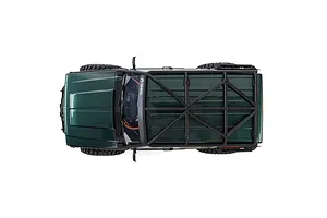 Top-down studio view of the green Axial SCX10 III Jeep Cherokee XJ RC rock crawler highlighting its roof rack.