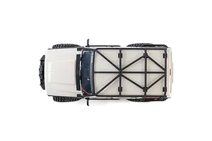 Top-down view of the Axial SCX10 III Jeep Cherokee XJ white RC rock crawler showing its roof rack.