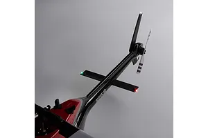 Close-up angled view of the tail boom, horizontal stabilizers, and tail rotor of the Blade Jet Ranger 235CP RC helicopter featuring glowing LED lights.