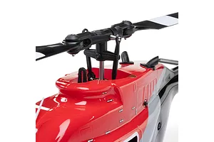 Close-up of the rotor head and red painted fuselage of the Blade Jet Ranger 235CP RC helicopter.