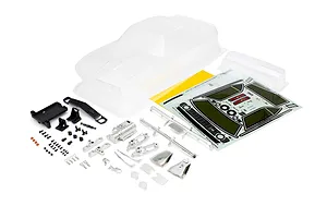 Unpainted clear RC car body shell with a decal sheet, chrome engine parts, mirrors, bumpers, and hardware on a white background.