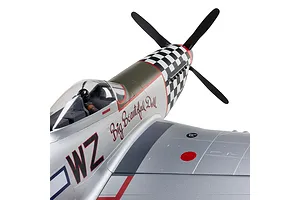 Close-up of the cockpit and nose of the E-Flite P-51D Mustang Big Beautiful Doll RC airplane against a white background.