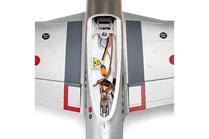 Top-down view of the electronics bay and receiver inside the silver foam fuselage of an E-Flite P-51D Mustang RC airplane.