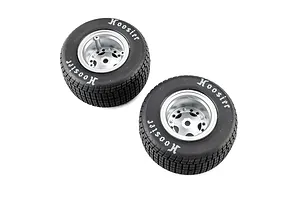 Two Losi 1/10 Hoosier soft compound RC tyres mounted on silver satin rims, viewed from an overhead angle against a white background.
