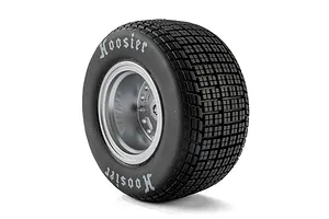 Single Losi 1/10 Hoosier soft compound RC tyre glued to a satin silver rim against a white background.