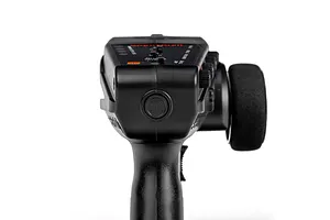 Rear-facing top-down view of the black Spektrum DX3 Smart DSMR transmitter showing the steering wheel on the right and control dials.