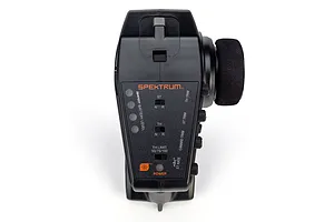 Top-down view of the Spektrum DX3 Smart transmitter showing the control panel, power button, and steering wheel.