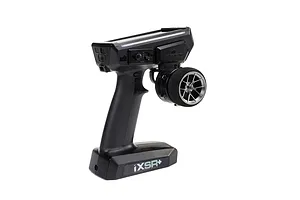 Spektrum RC transmitter featuring an installed gunmetal grey aluminium wide spoke steering wheel against a white background.