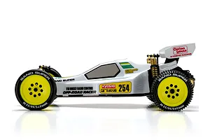 Studio side profile of the Kyosho Ultima Pro 1/10 electric 2WD RC buggy featuring a white body, yellow wheels, and sponsor decals.