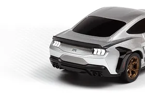 Close-up rear angle of the silver HPI Nano-TTR Ford Mustang Spec 5 RC car, showing lighted tail lights, bronze wheel, and black rear bumper details.