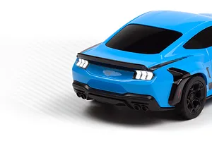 Close-up of the rear end of a blue HPI Nano-TTR Ford Mustang Spec 5 RC car, showing illuminated taillights and quad exhaust tips.