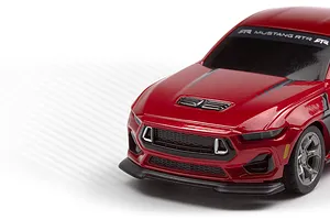 Close-up studio view of the front and side of the red HPI Nano-TTR Ford Mustang Spec 5 RC car body.