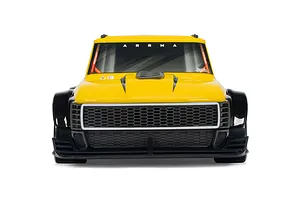 Front view of the yellow ARRMA Infraction Grom 3S RC car body, highlighting the front grille and tinted windshield.