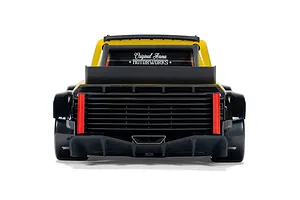 Rear view of the ARRMA Infraction Grom 3S RC car in yellow, showing rear diffuser and Original Arrma Motorworks window decal.