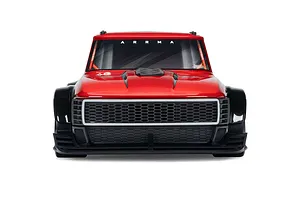 Front view of the red ARRMA Infraction Grom 3S RC car body showing the front grille, hood, and windshield.