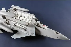 Underside view of the Trumpeter 1/48 scale Chinese J-20S Mighty Dragon plastic model jet kit, showing landing gear and weapons bay.