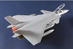 Trumpeter Chinese J-20S Mighty Dragon Jet plastic model kit assembled in grey unpainted plastic against a blue background.