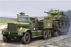 Box art painting of an M19 tank transporter carrying a Sherman tank on an outdoor track.