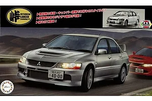 Fujimi 1/24 Mitsubishi Lancer Evolution IX GSR plastic model kit box art showing a silver car driving on a road.