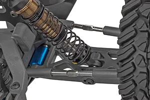 Close-up of the suspension and threaded shock absorber on the Element RC Gaterunner RC trophy truck.
