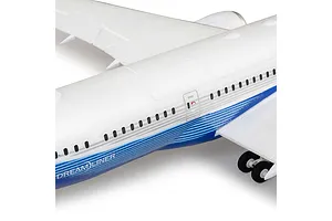 Close-up of white E-Flite Boeing 787 Dreamliner RC plane fuselage featuring blue and silver livery and landing gear.