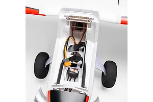 Top-down view of the interior battery compartment and electronics of the E-Flite Turbo Timber Evolution 1.5m RC plane.