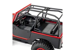 Close-up studio view of the red Axial SCX30 Jeep CJ-7 Renegade RC crawler interior and roll cage.