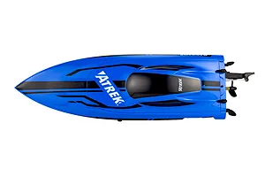 Top-down studio view of the blue Atrek Riptide RC speed boat, showing its hull, black canopy, decals, and rear propeller assembly.
