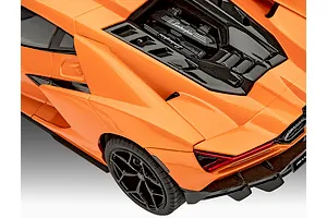 Close-up angled view of the rear and engine cover of the Revell 1/24 scale Lamborghini Revuelto model car in orange.