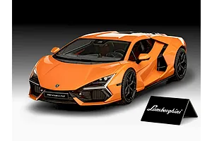 Studio photo of an assembled and painted orange 1/24 scale Revell Lamborghini Revuelto model car with a small Lamborghini sign.