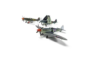 Three assembled and painted plastic model fighter aircraft shown against a white background.