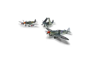 Three assembled and painted plastic model fighter aircraft shown against a plain white studio background.